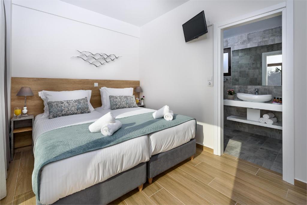 Postel nebo postele na pokoji v ubytování Platanias Villa Mirsini