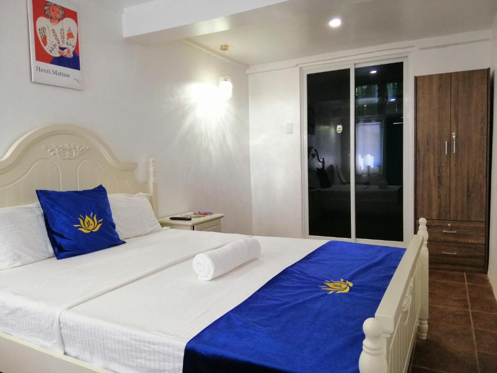 Postel nebo postele na pokoji v ubytování Eastern Garan Hen Yuan Resort