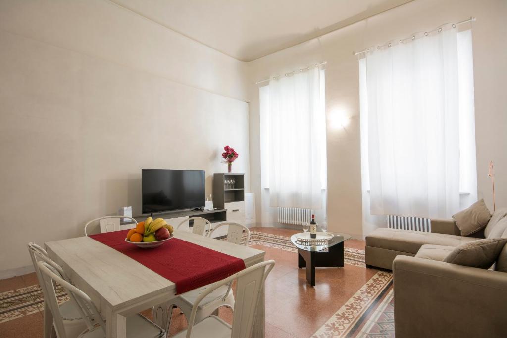 TV a/nebo společenská místnost v ubytování Piazza Paradiso Accommodation