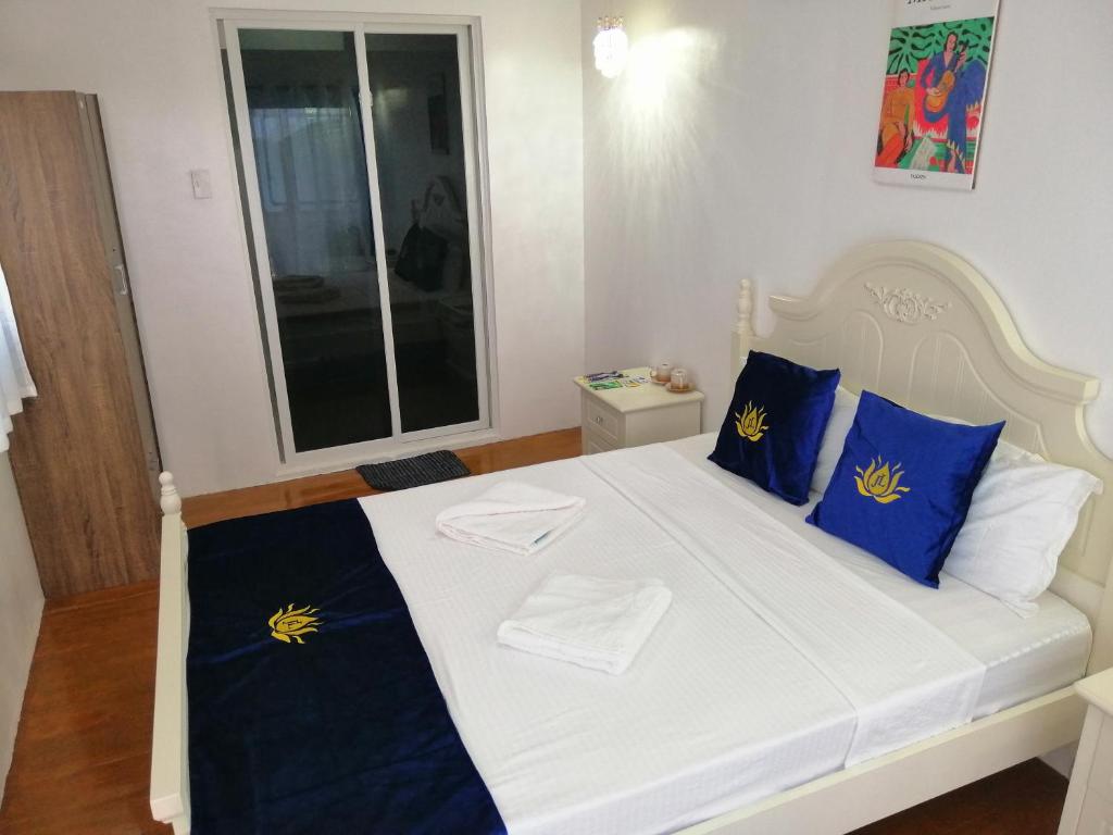 Postel nebo postele na pokoji v ubytování Eastern Garan Hen Yuan Resort
