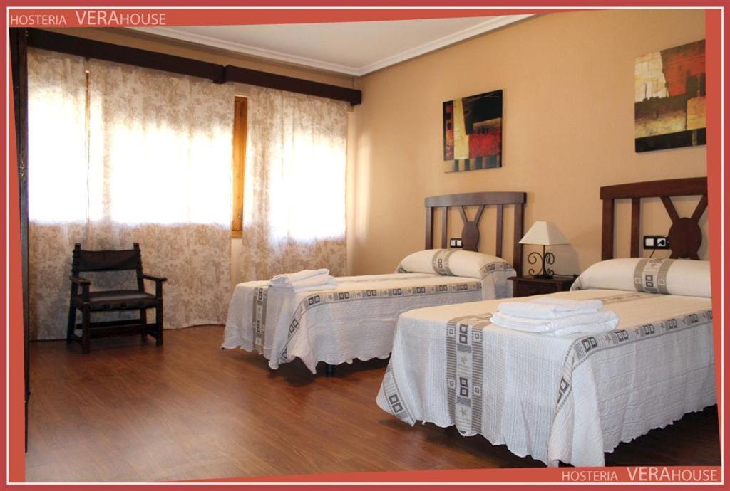 Postel nebo postele na pokoji v ubytování Hosteria Verahouse