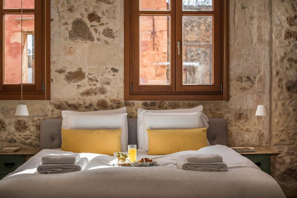Postel nebo postele na pokoji v ubytování Residenza Vranas Boutique Hotel