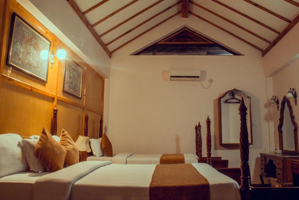 Letto o letti in una camera di Lake View Resort