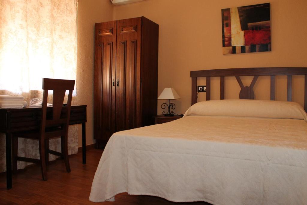 Postel nebo postele na pokoji v ubytování Hosteria Verahouse