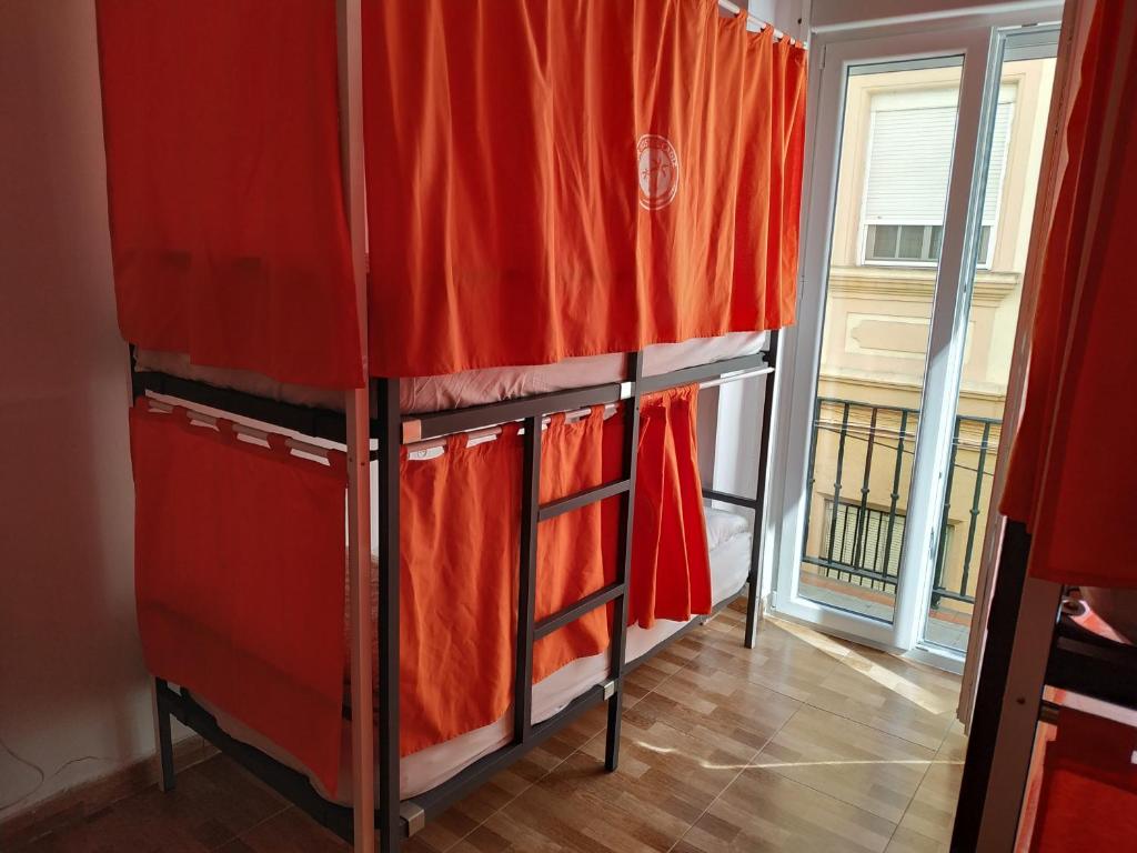 Postel nebo postele na pokoji v ubytování Summer Cádiz