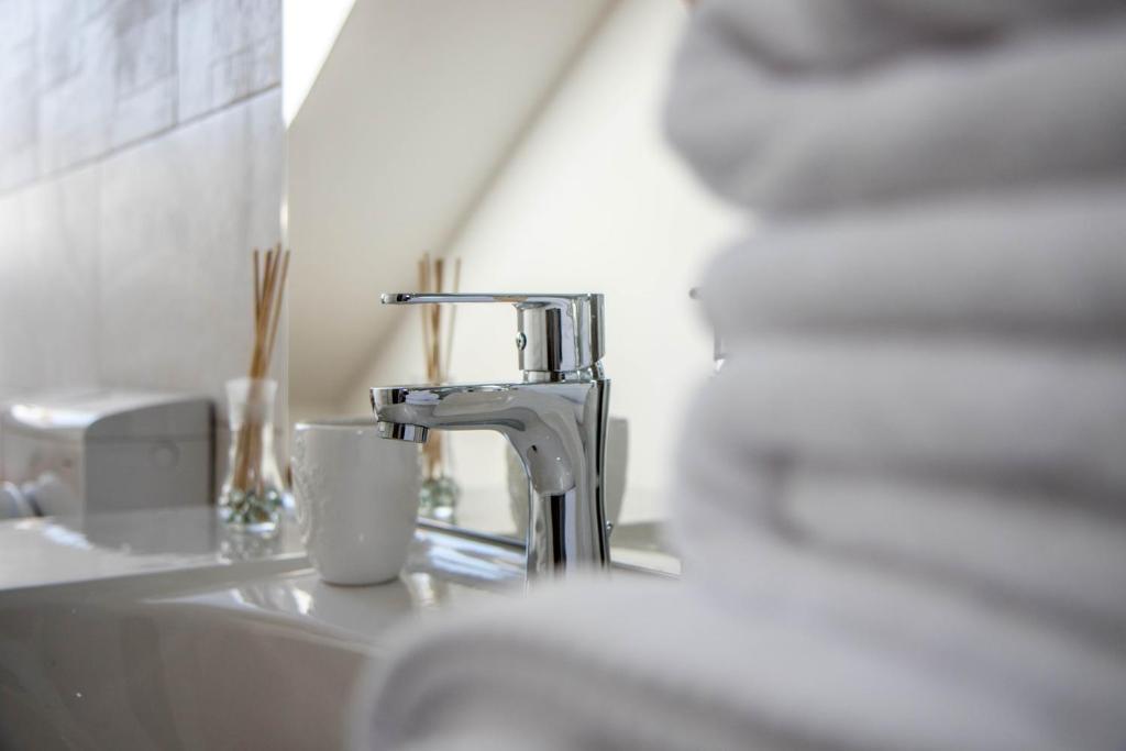 Koupelna v ubytování Antique ApartHotel