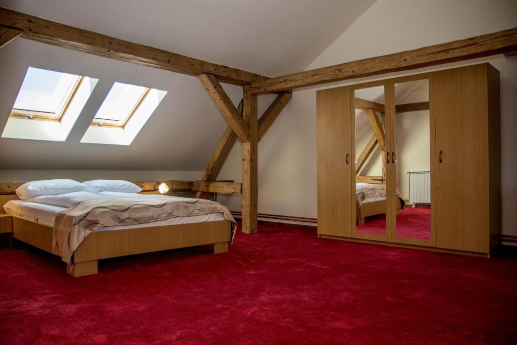 Postel nebo postele na pokoji v ubytování Antique ApartHotel