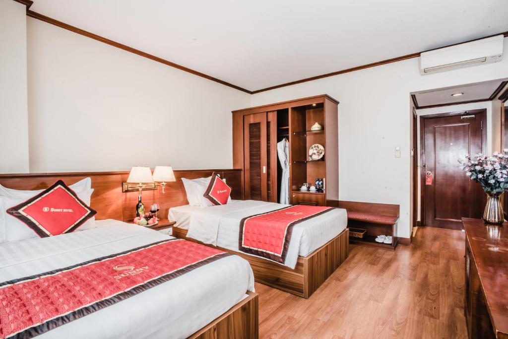 Postel nebo postele na pokoji v ubytování S79 Sunny Hotel 2