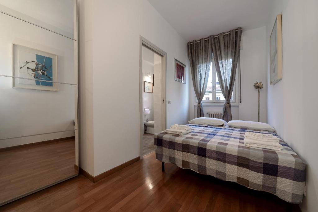Posteľ alebo postele v izbe v ubytovaní Casa da Suite Classica