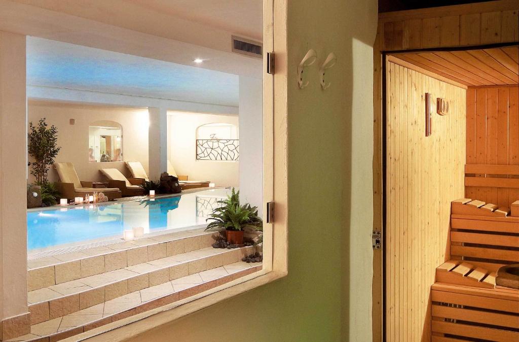 Bazén v ubytování COLONNA RESORT, a Colonna Luxury Beach Hotel, Porto Cervo nebo v jeho okolí