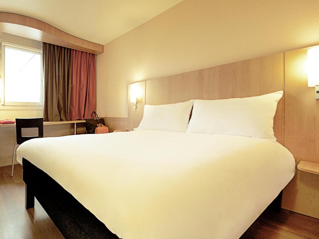 Postel nebo postele na pokoji v ubytování Hotel ibis Braga