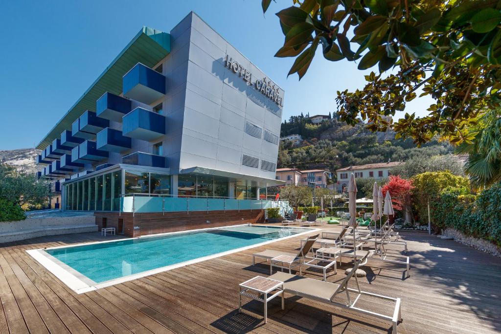 The swimming pool at or close to Caravel Bike Hotel