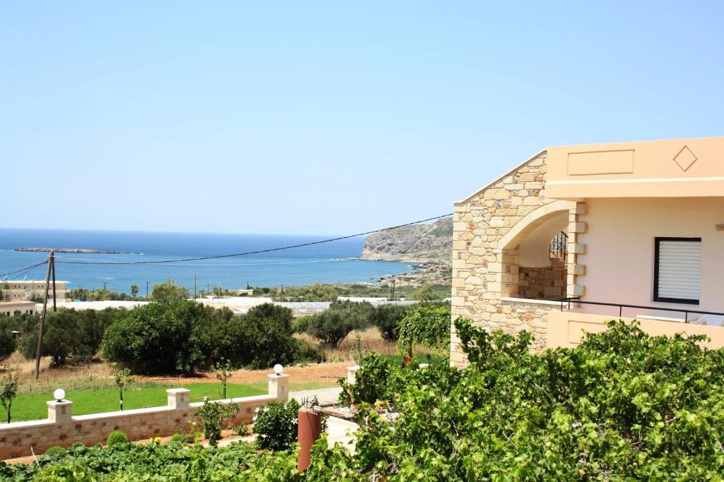 a villa with a view of the ocean at Romantica Apartments in Falasarna