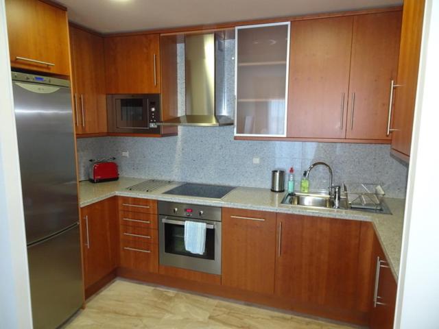 Kuchyňa alebo kuchynka v ubytovaní Apartment Marisol L'Ampolla