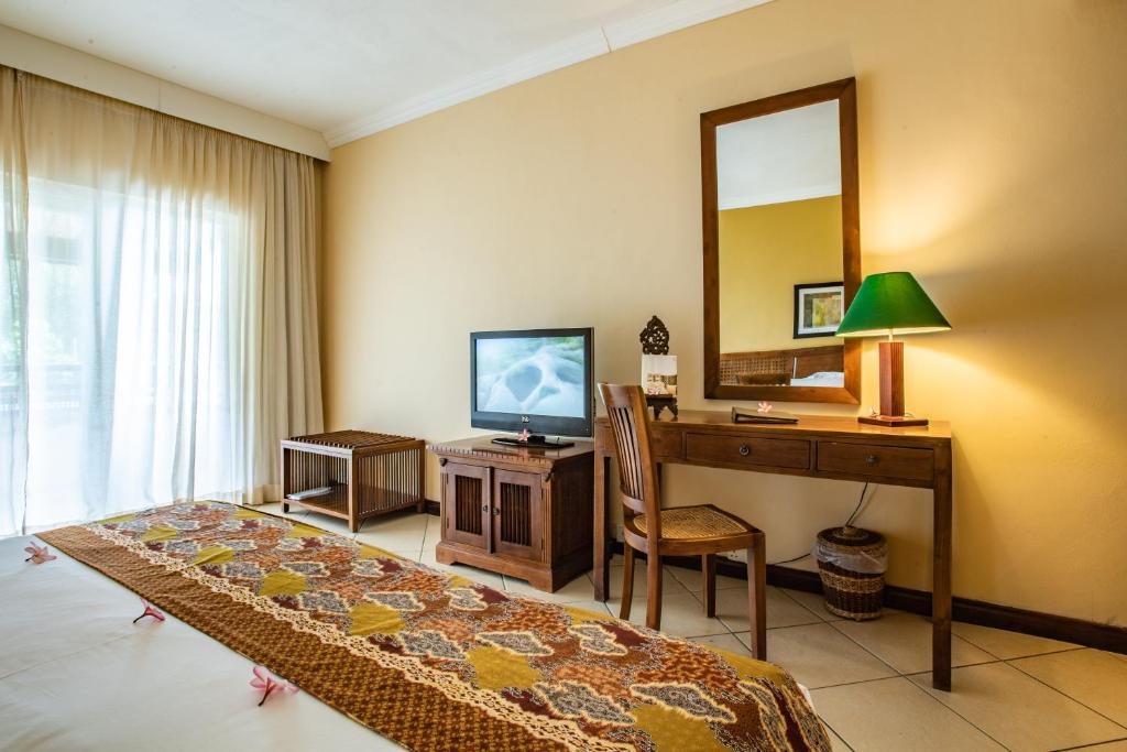 TV a/nebo společenská místnost v ubytování Aanari Hotel & Spa- Mauritius
