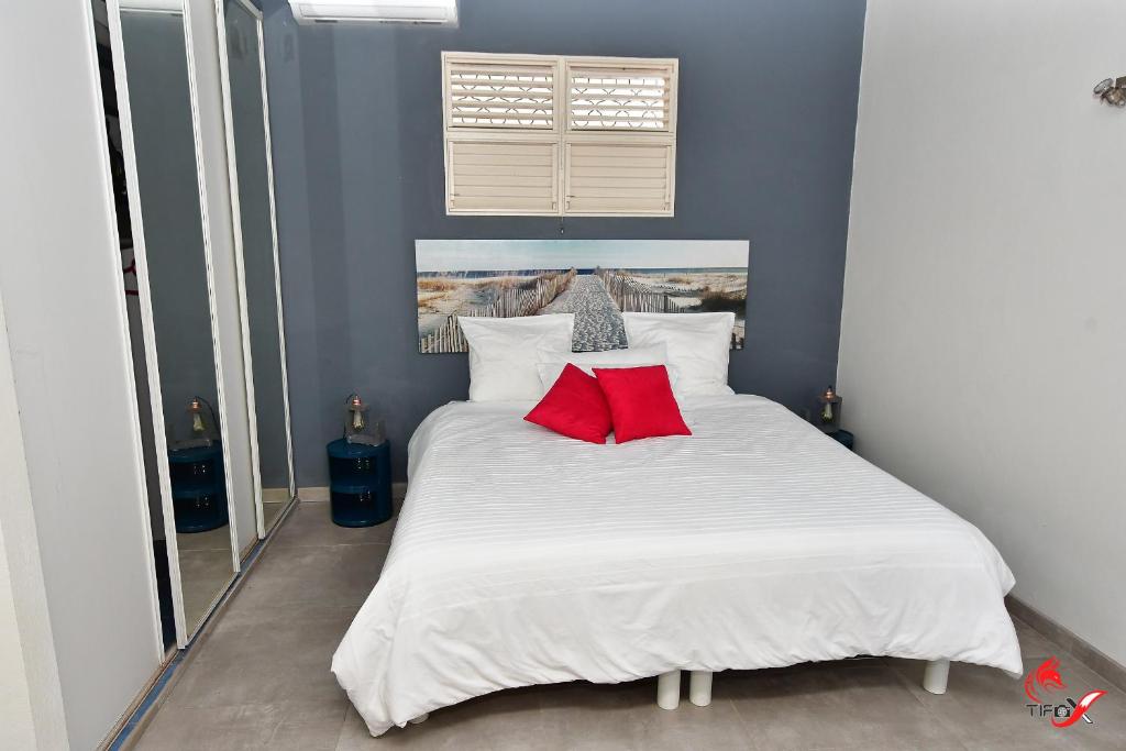 Letto o letti in una camera di Villa Fleur d'O
