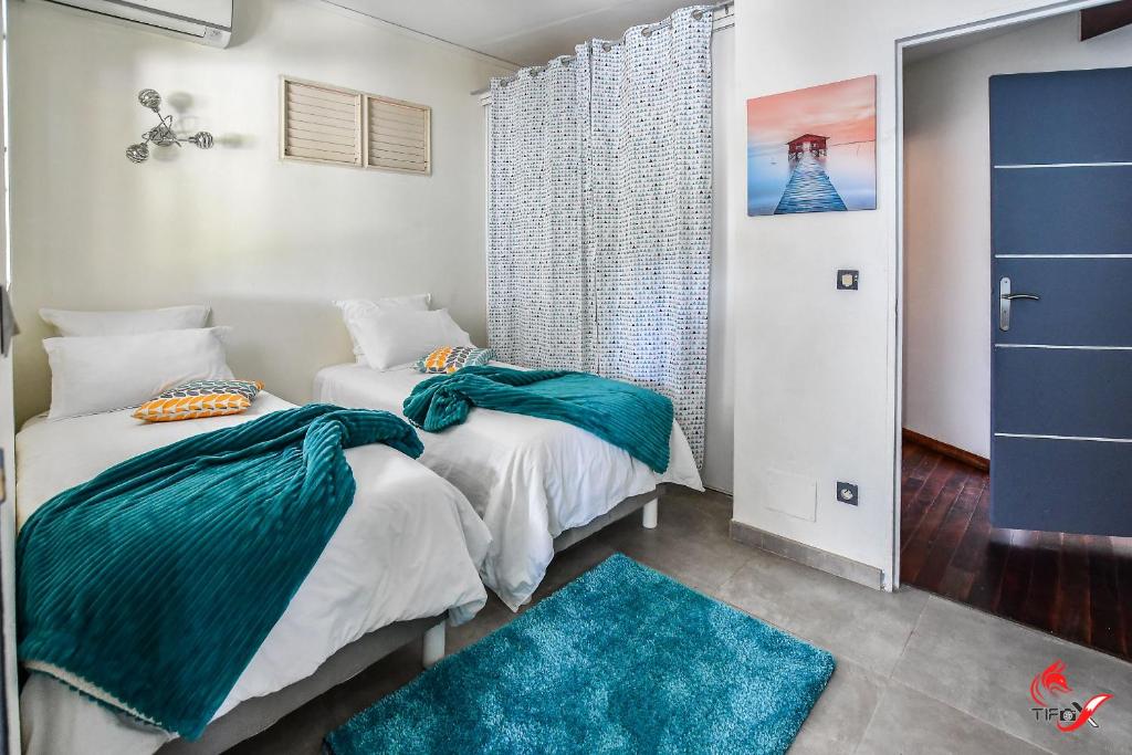 Letto o letti in una camera di Villa Fleur d'O