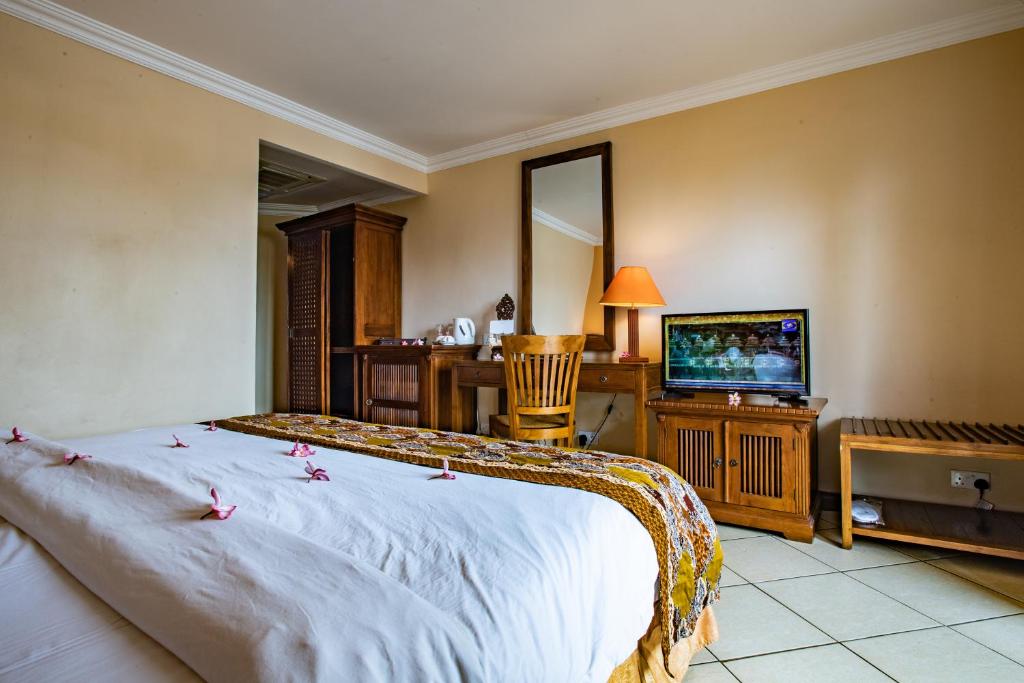 TV a/nebo společenská místnost v ubytování Aanari Hotel & Spa- Mauritius