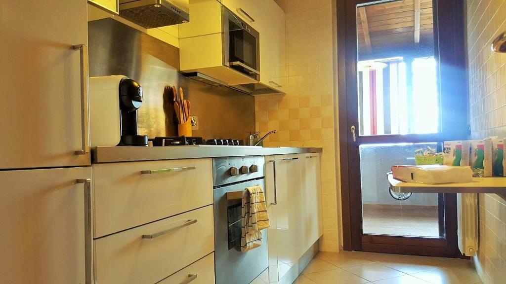 Kuchnia lub aneks kuchenny w obiekcie Domus al Parco Guest House