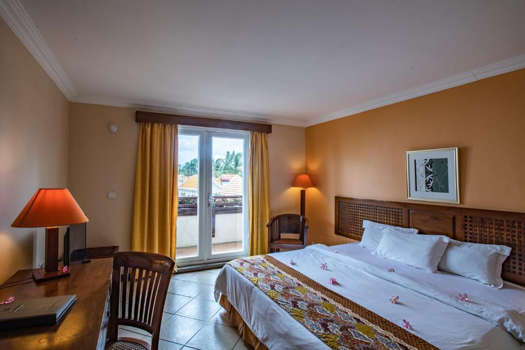 Postel nebo postele na pokoji v ubytování Aanari Hotel & Spa- Mauritius