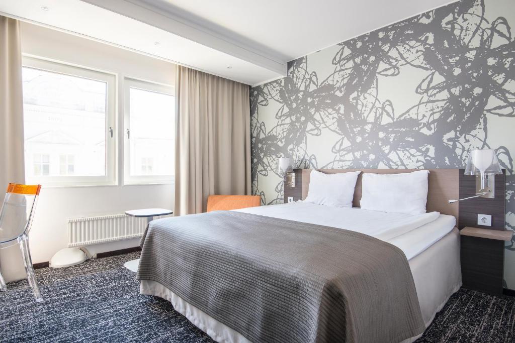 Postel nebo postele na pokoji v ubytování Quality Hotel Luleå