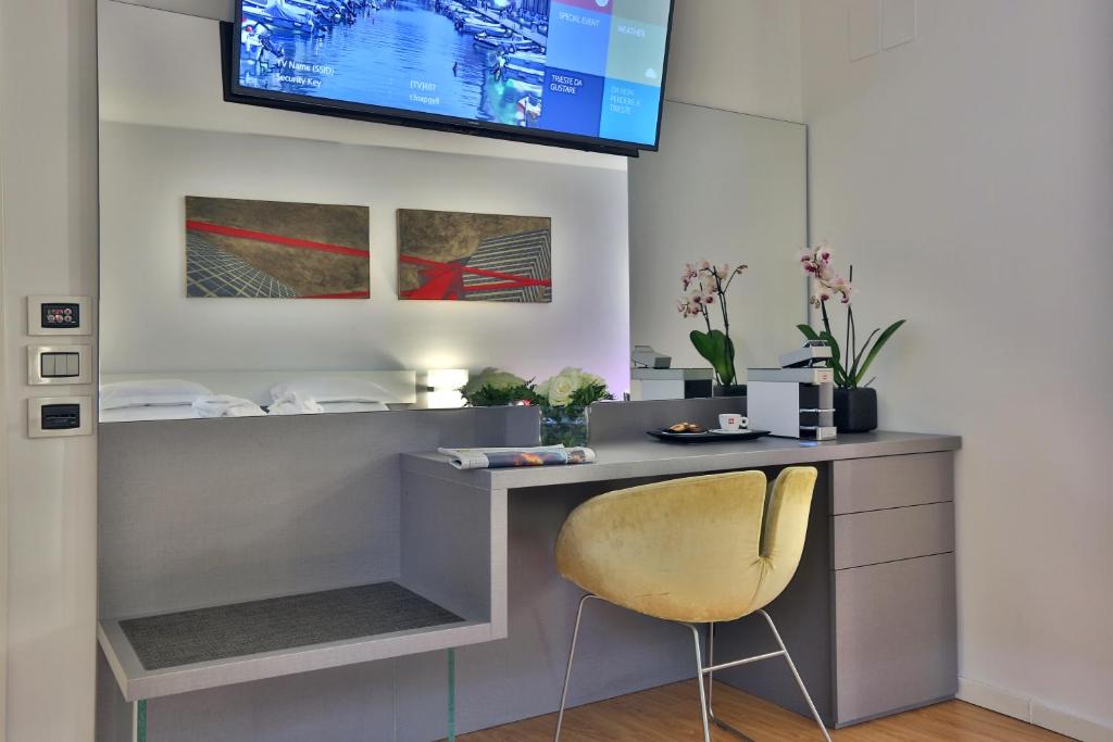 TV a/nebo společenská místnost v ubytování Urban Hotel Design