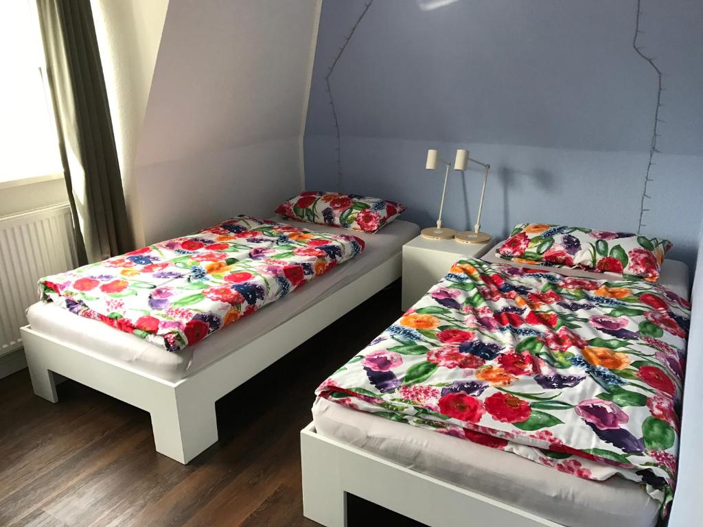 Säng eller sängar i ett rum på Design Apartment
