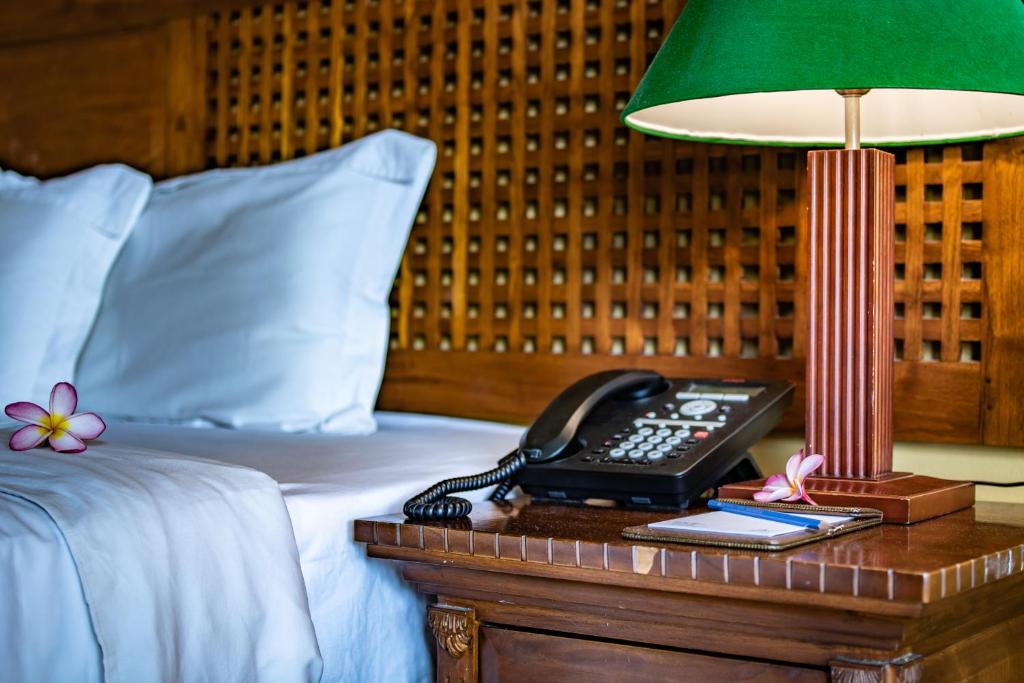 Postel nebo postele na pokoji v ubytování Aanari Hotel & Spa- Mauritius