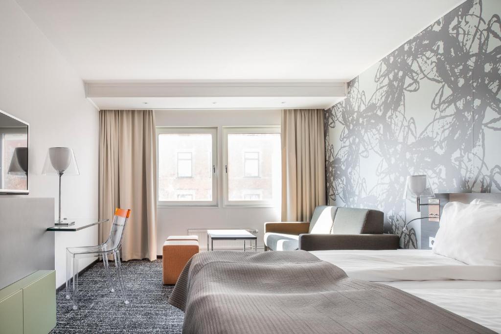 Postel nebo postele na pokoji v ubytování Quality Hotel Luleå