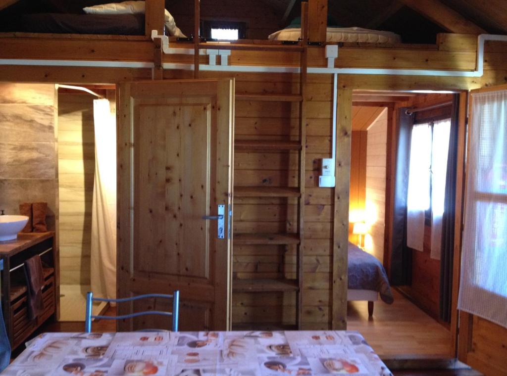 Postel nebo postele na pokoji v ubytování Les Bungalows les Vanilliers, Sud Sauvage avec piscine