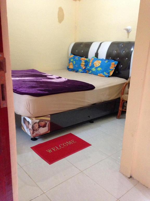 Postel nebo postele na pokoji v ubytování Aman's Guesthouse