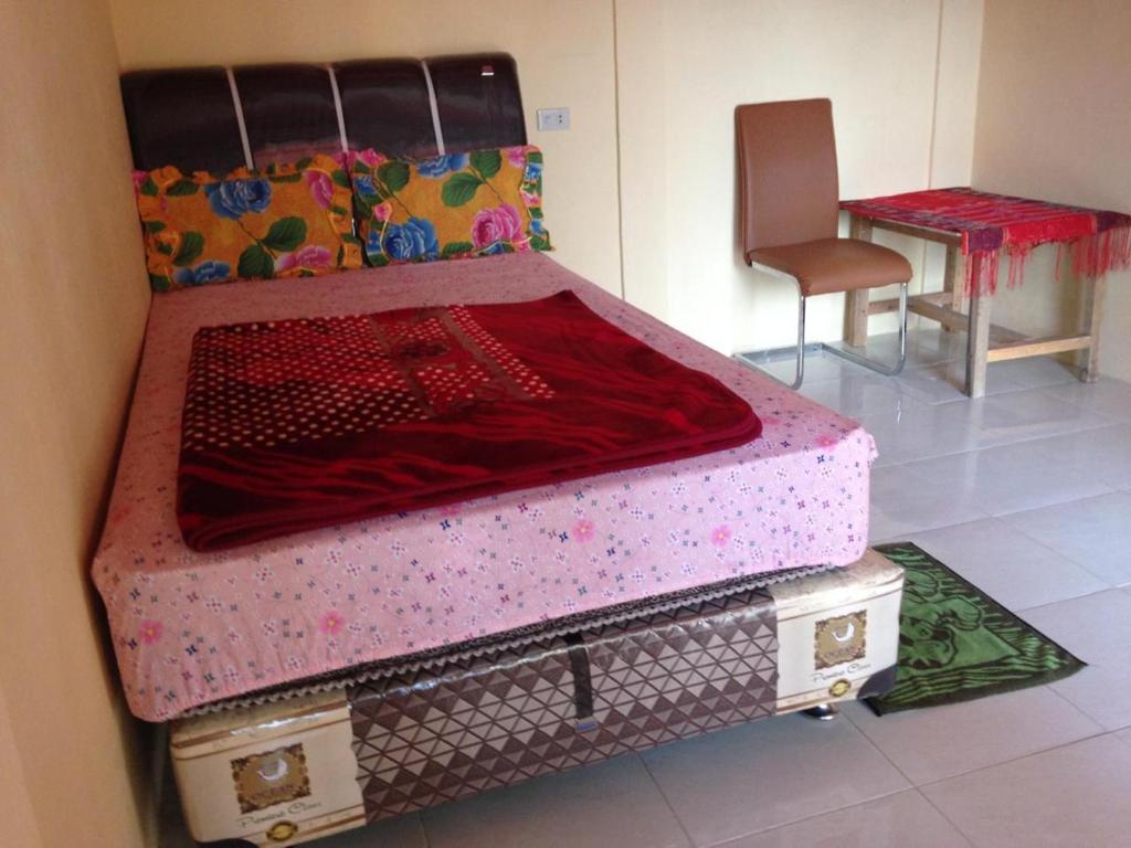 Postel nebo postele na pokoji v ubytování Aman's Guesthouse