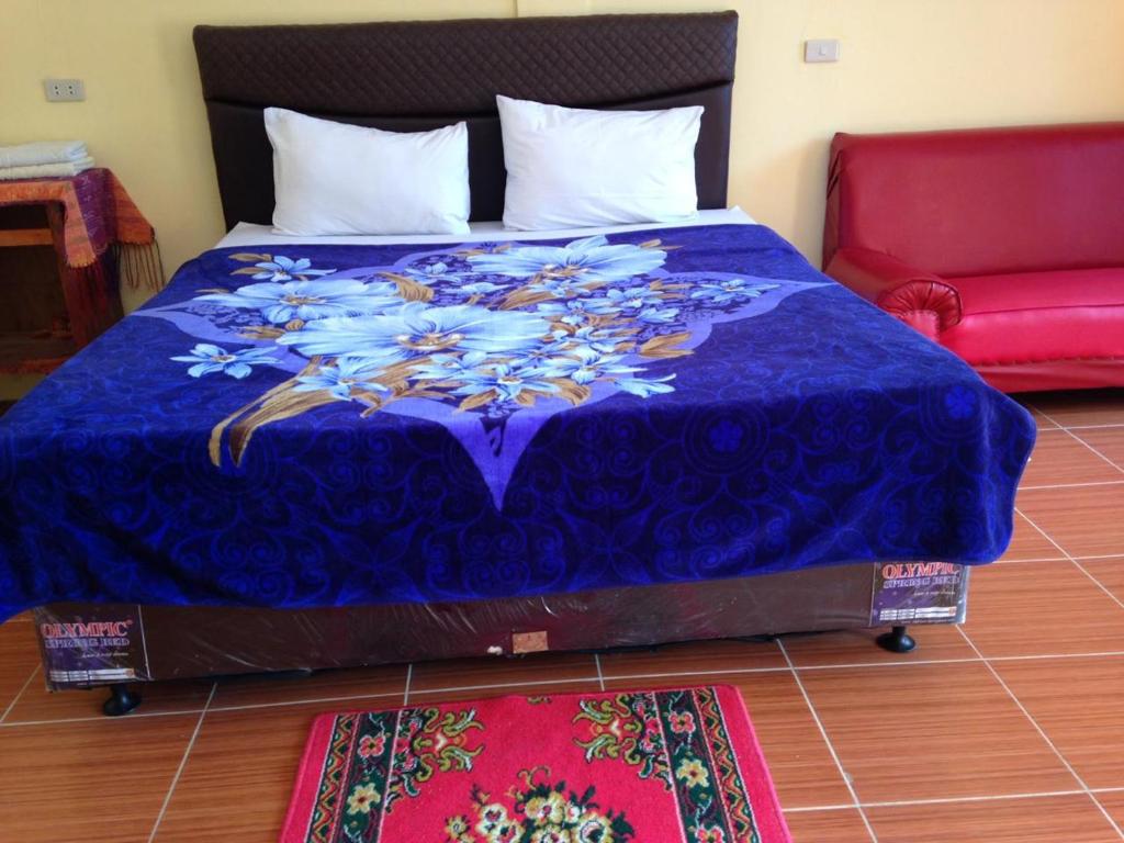Postel nebo postele na pokoji v ubytování Aman's Guesthouse