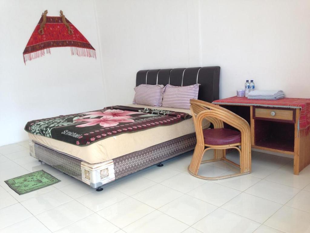 Postel nebo postele na pokoji v ubytování Aman's Guesthouse