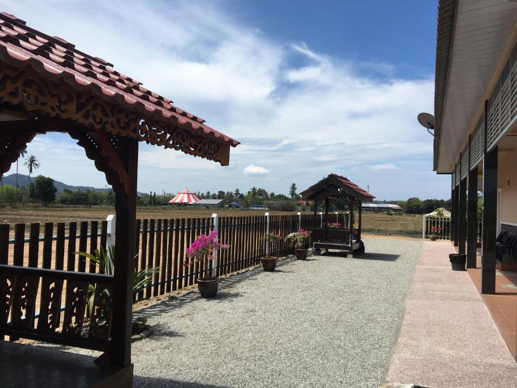 Fotografie z fotogalerie ubytování D’ Village Cottage v destinaci Pantai Cenang