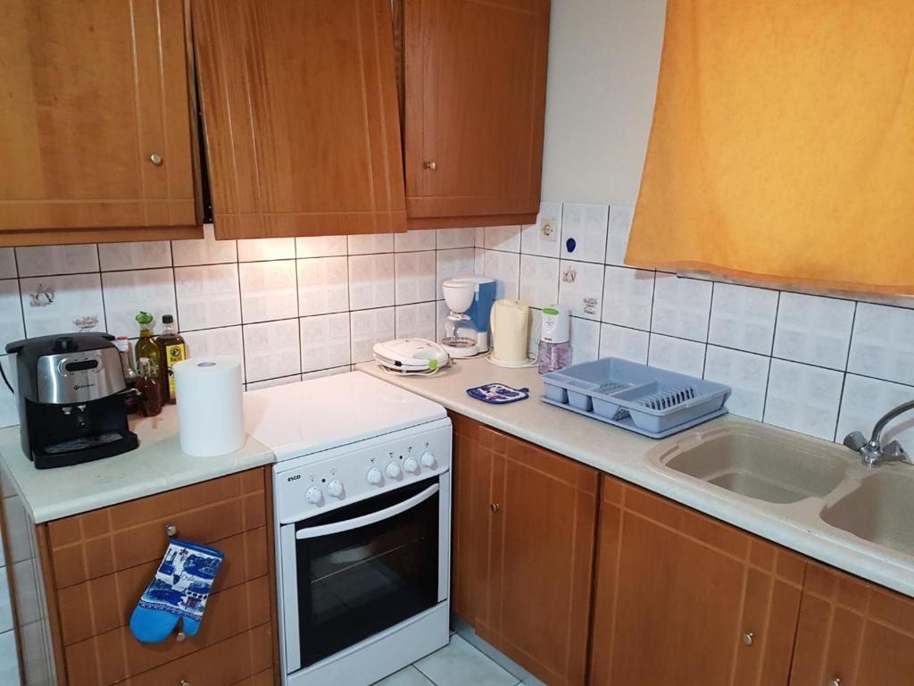 Kuchyňa alebo kuchynka v ubytovaní Mamis Studio