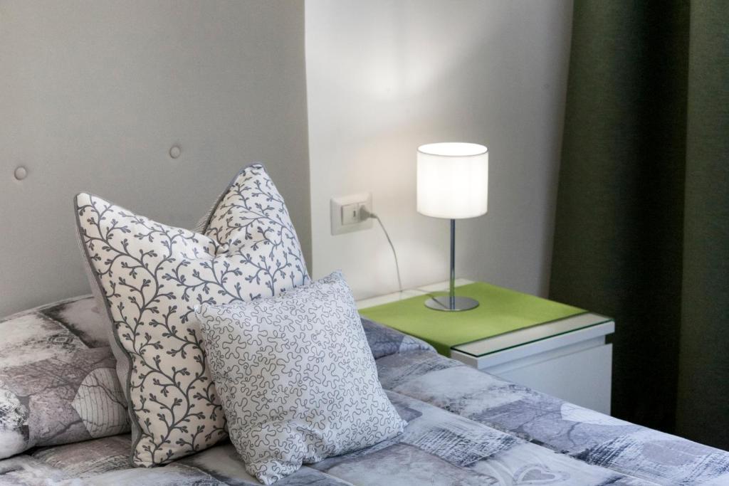 Posteľ alebo postele v izbe v ubytovaní A Sorrento B&B