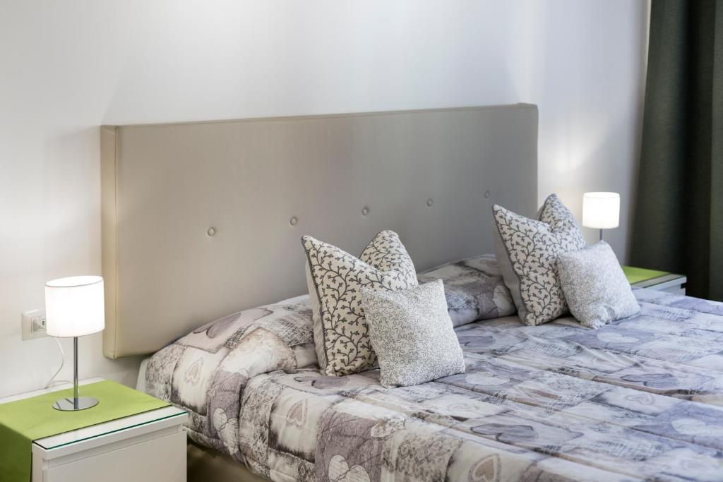 Posteľ alebo postele v izbe v ubytovaní A Sorrento B&B