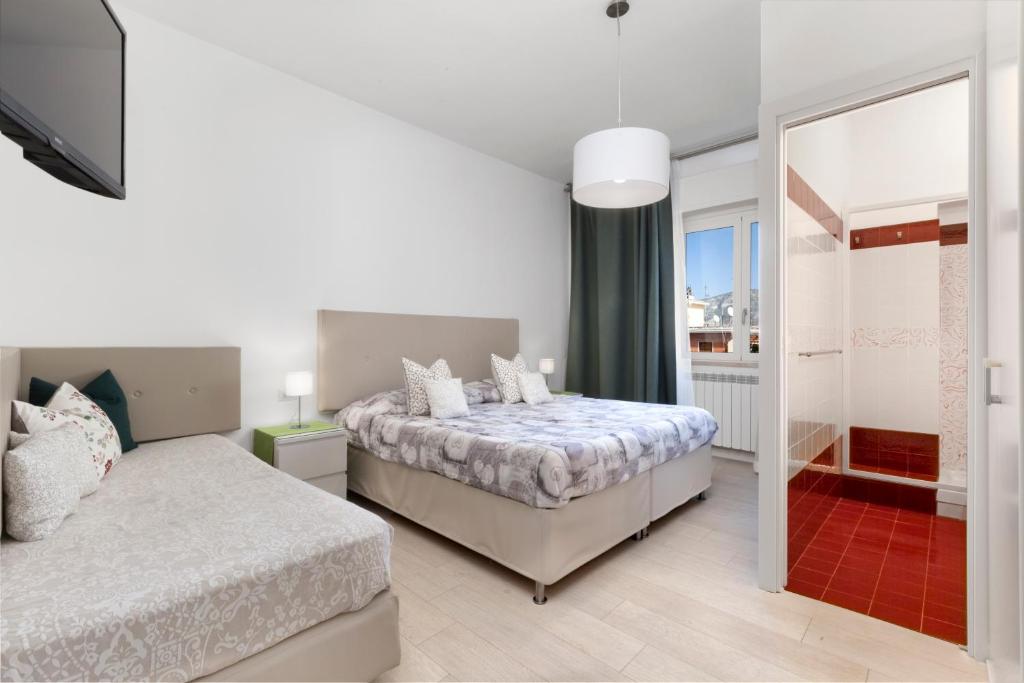 Posteľ alebo postele v izbe v ubytovaní A Sorrento B&B
