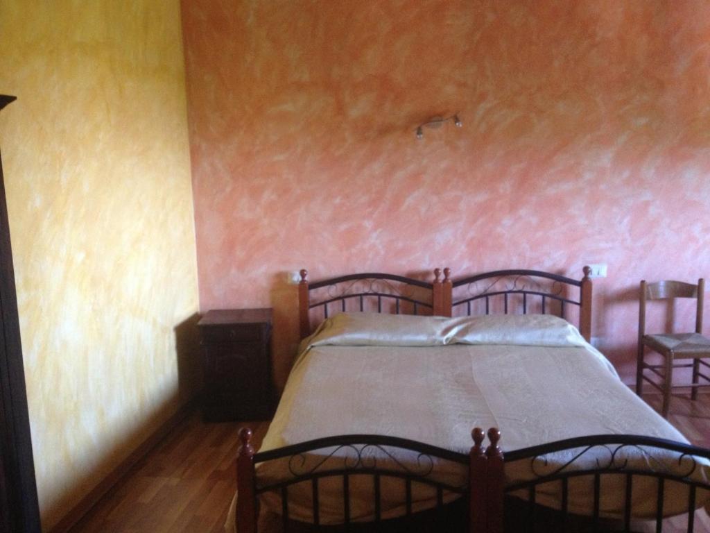 Postel nebo postele na pokoji v ubytování Agriturismo L'Antico Casale