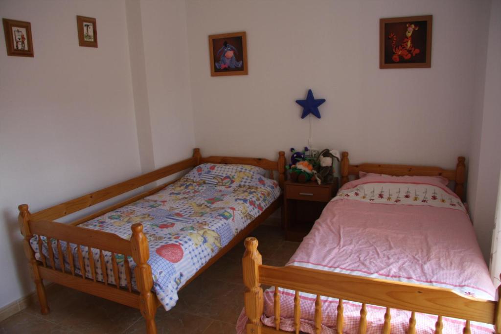 Posteľ alebo postele v izbe v ubytovaní Hondon-Villa