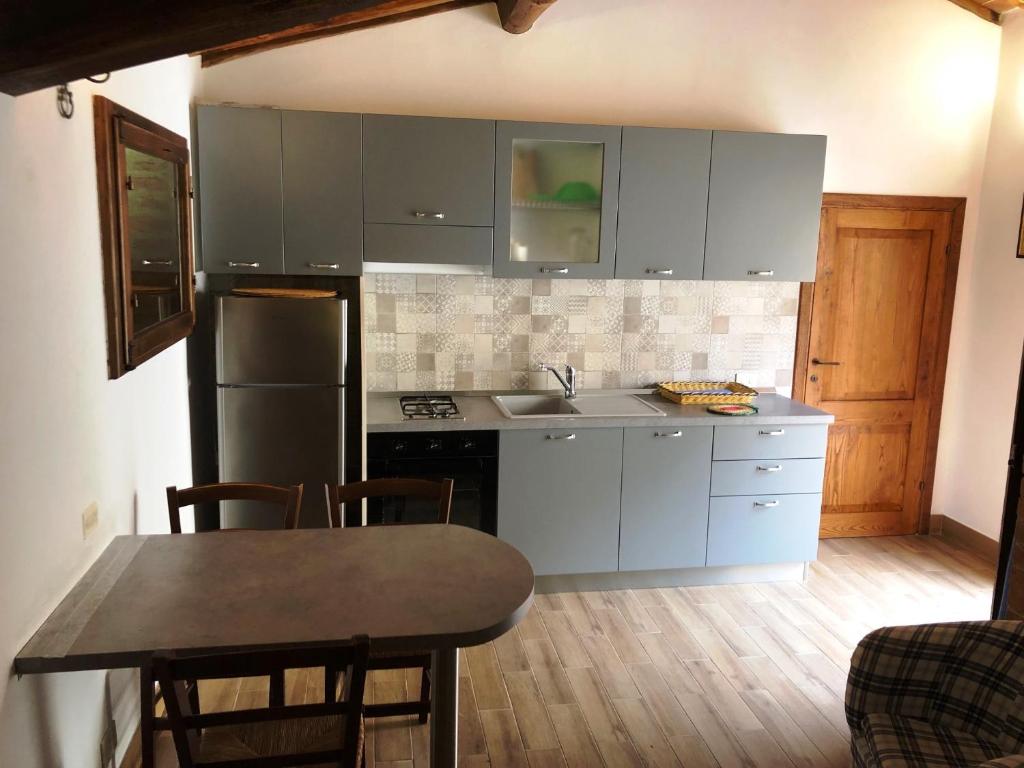 Kuchyň nebo kuchyňský kout v ubytování Agriturismo Fattoria Di Corsano