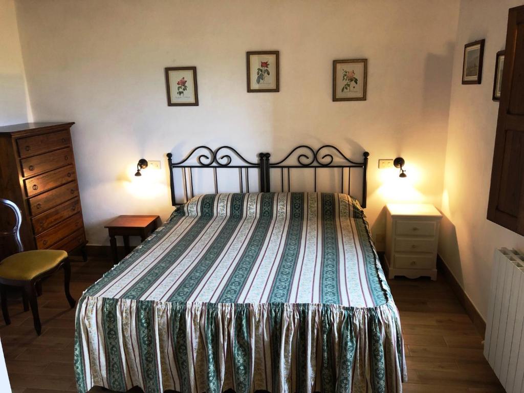 Postel nebo postele na pokoji v ubytování Agriturismo Fattoria Di Corsano