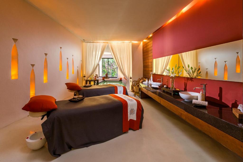 Postel nebo postele na pokoji v ubytování Grand Velas Riviera Maya - All Inclusive