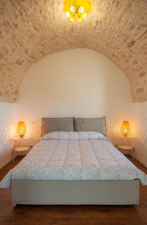 Postel nebo postele na pokoji v ubytování Il Castello di Campello
