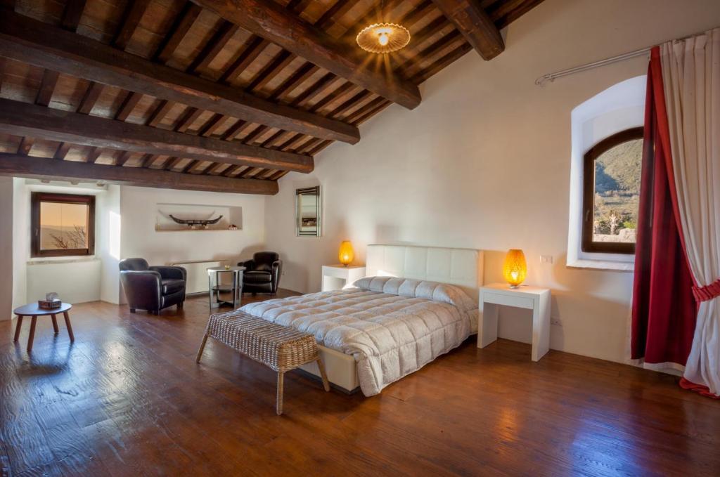 Postel nebo postele na pokoji v ubytování Il Castello di Campello