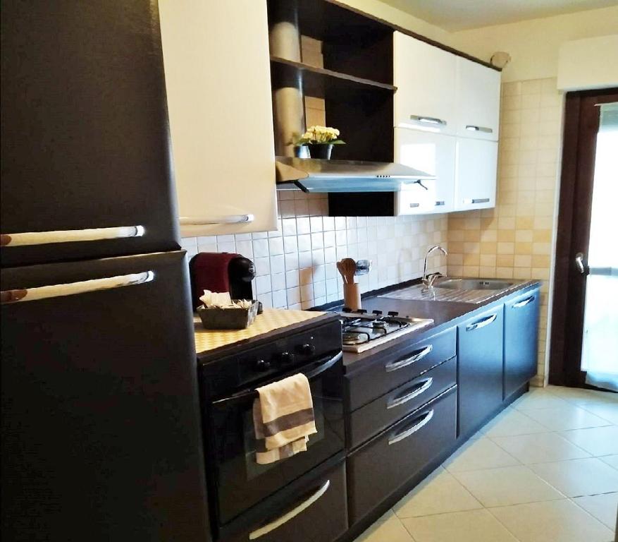 Kuchnia lub aneks kuchenny w obiekcie Domus al Parco Guest House