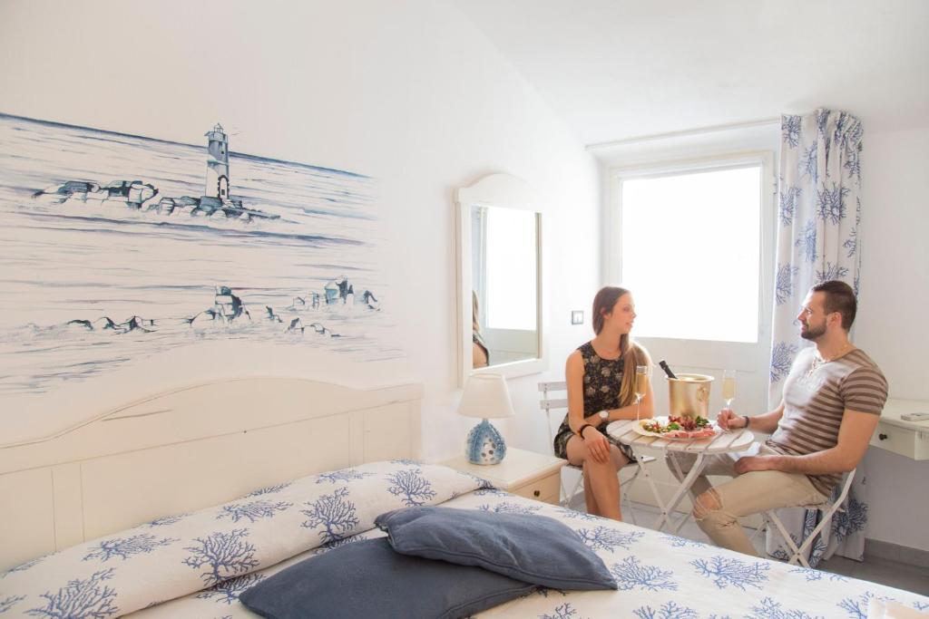 Posezení v ubytování Hotel Cala Di Seta