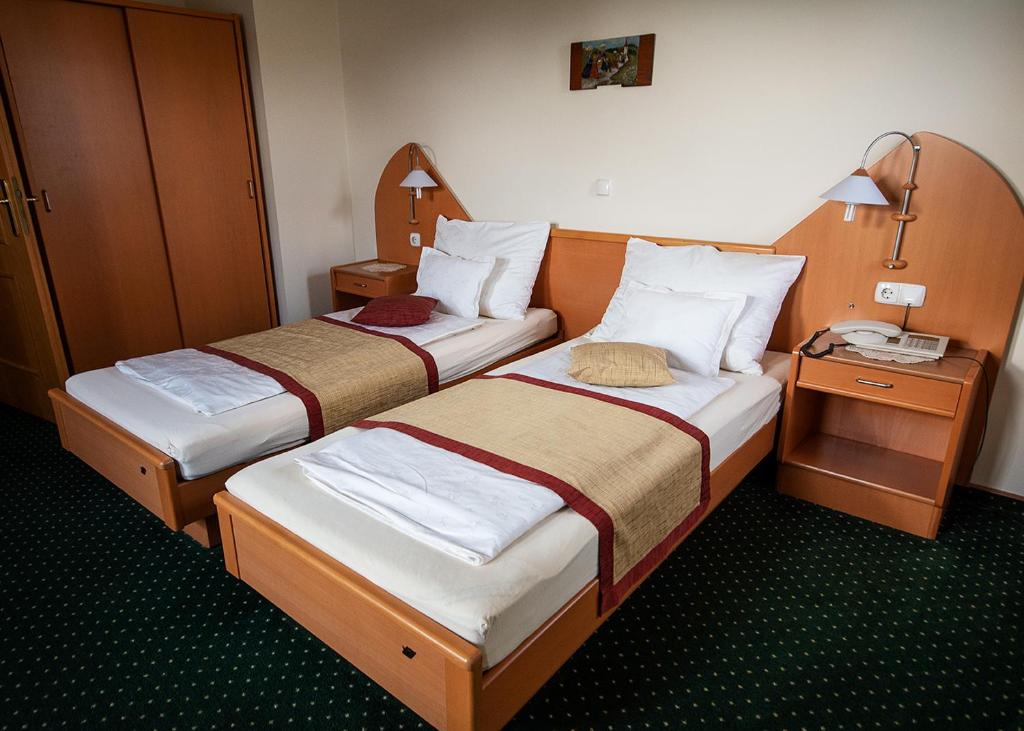 Postel nebo postele na pokoji v ubytování Guesthouse Tulipan