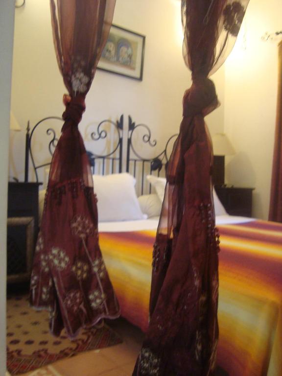 Letto o letti in una camera di Riad Jnane Mogador